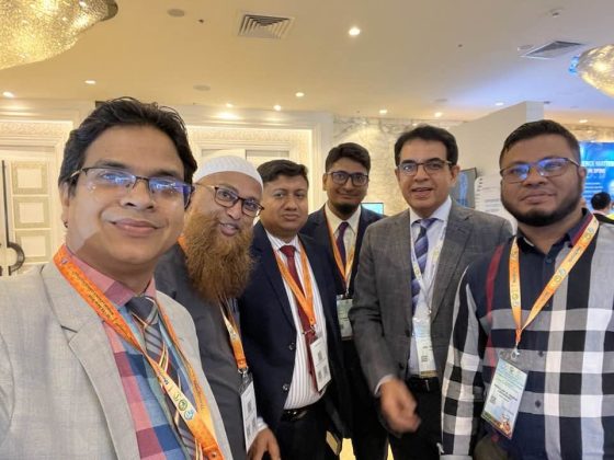 With colleagues at a conference