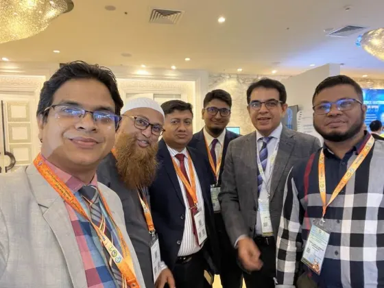 With colleagues at a conference