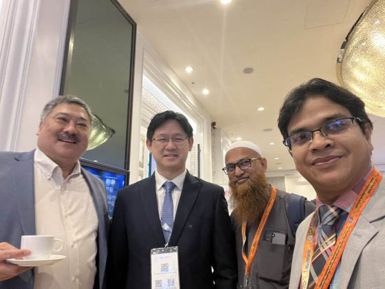 With colleagues at a conference