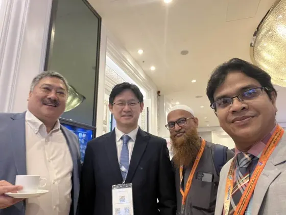 With colleagues at a conference