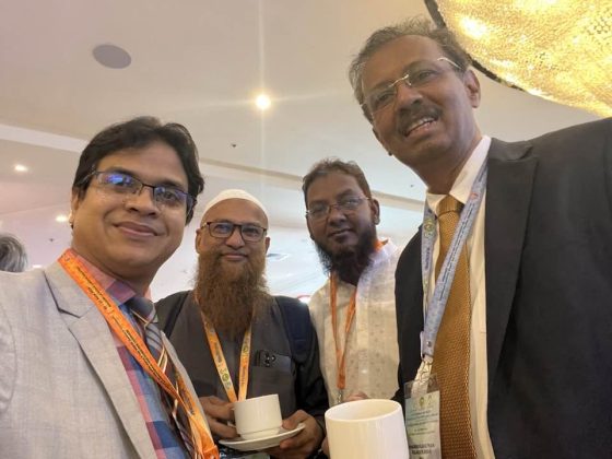 With colleagues at a conference